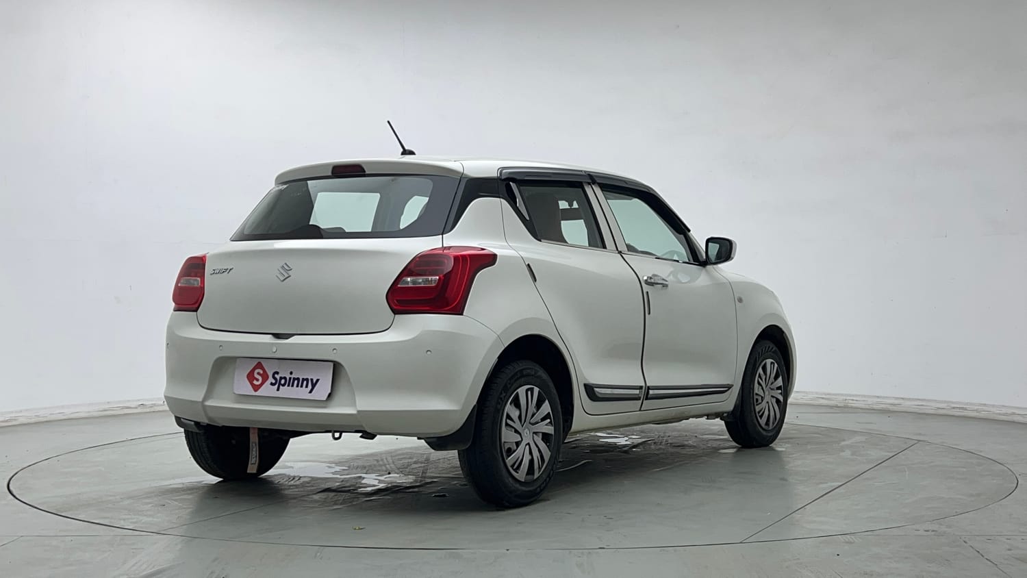 Used 2023 Maruti Suzuki Swift LXi Petrol Manual exterior RIGHT REAR CORNER VIEW