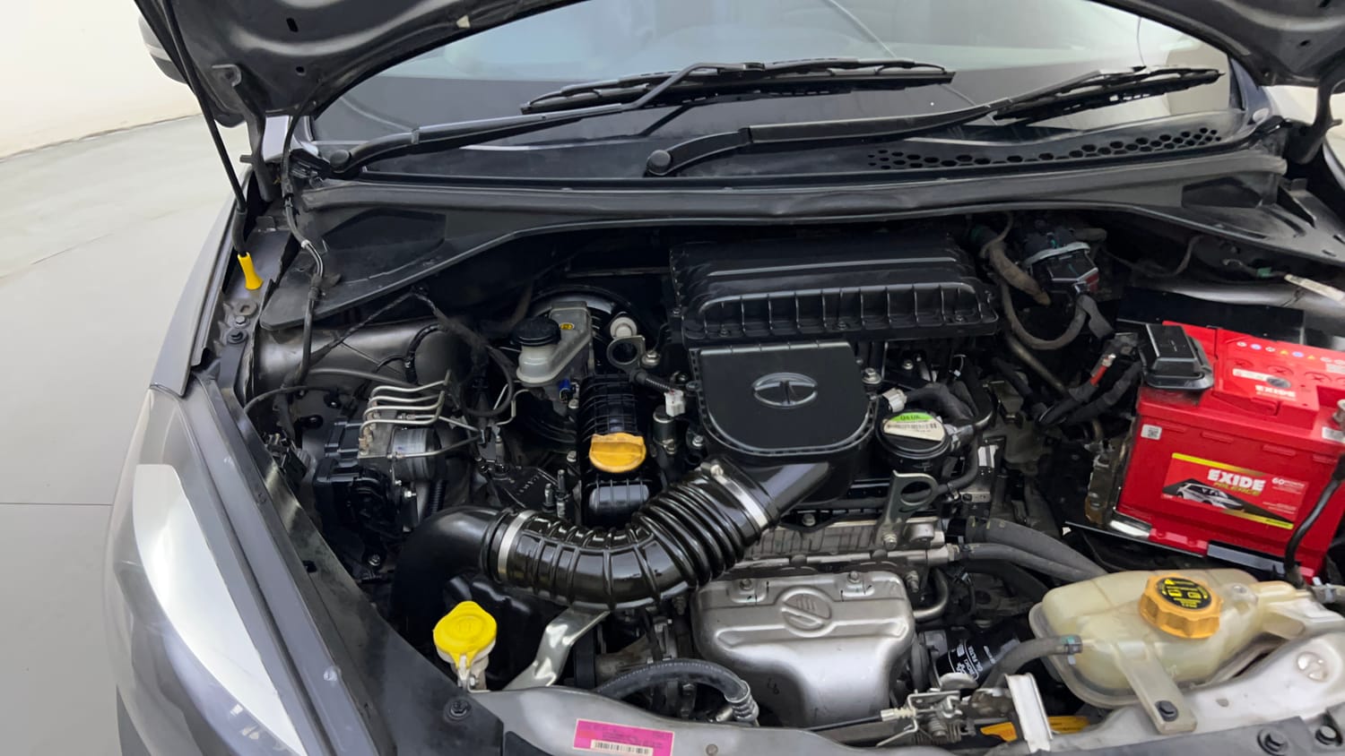 Used 2019 Tata Tiago Revotron XZA Plus Petrol Automatic engine ENGINE RIGHT SIDE HINGE & APRON VIEW