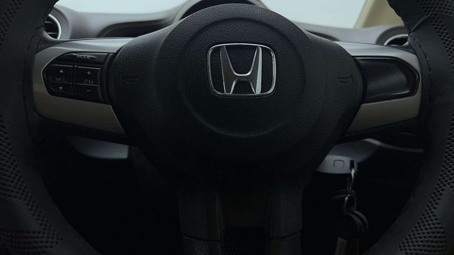 Used 2013 Honda Brio S MT Petrol Manual top_features Steering mounted controls