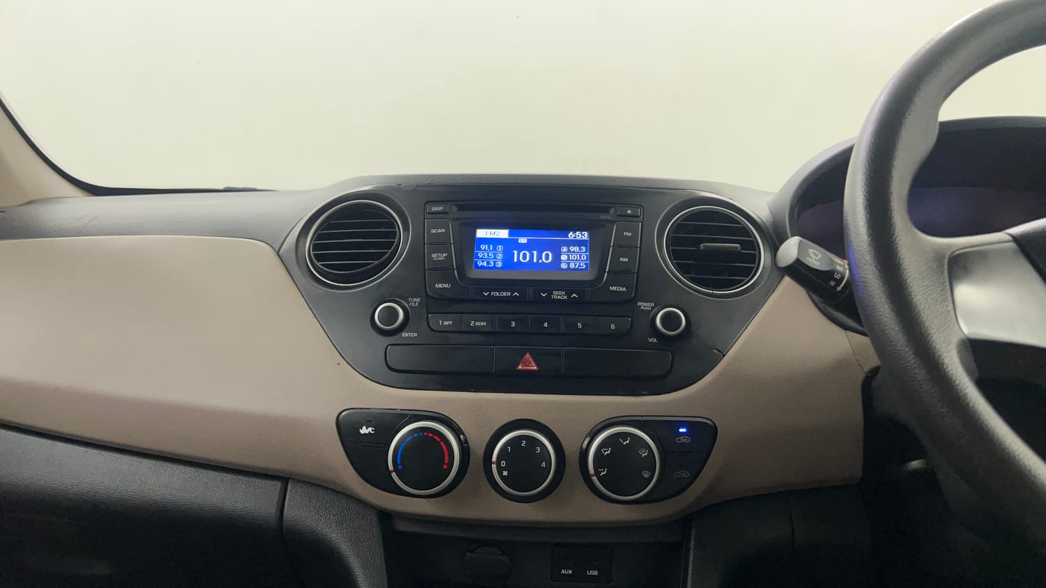 Used 2014 Hyundai Grand i10 Sportz 1.2 Kappa VTVT Petrol Manual interior MUSIC SYSTEM & AC CONTROL VIEW