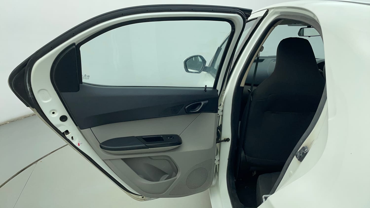 Used 2016 Tata Tiago Revotron XT Petrol Manual interior LEFT REAR DOOR OPEN VIEW