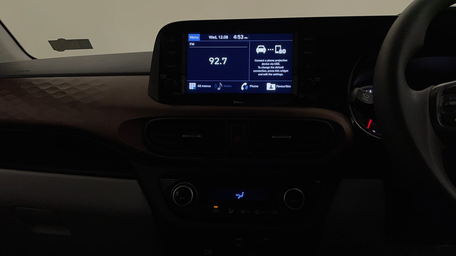 Used 2020 Hyundai Aura SX Plus 1.2 AMT Petrol Petrol Automatic interior MUSIC SYSTEM & AC CONTROL VIEW