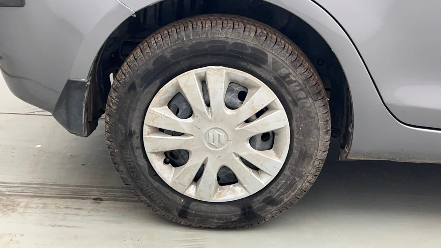 Used 2013 Maruti Suzuki Swift Dzire VXI Petrol Manual tyres RIGHT REAR TYRE RIM VIEW