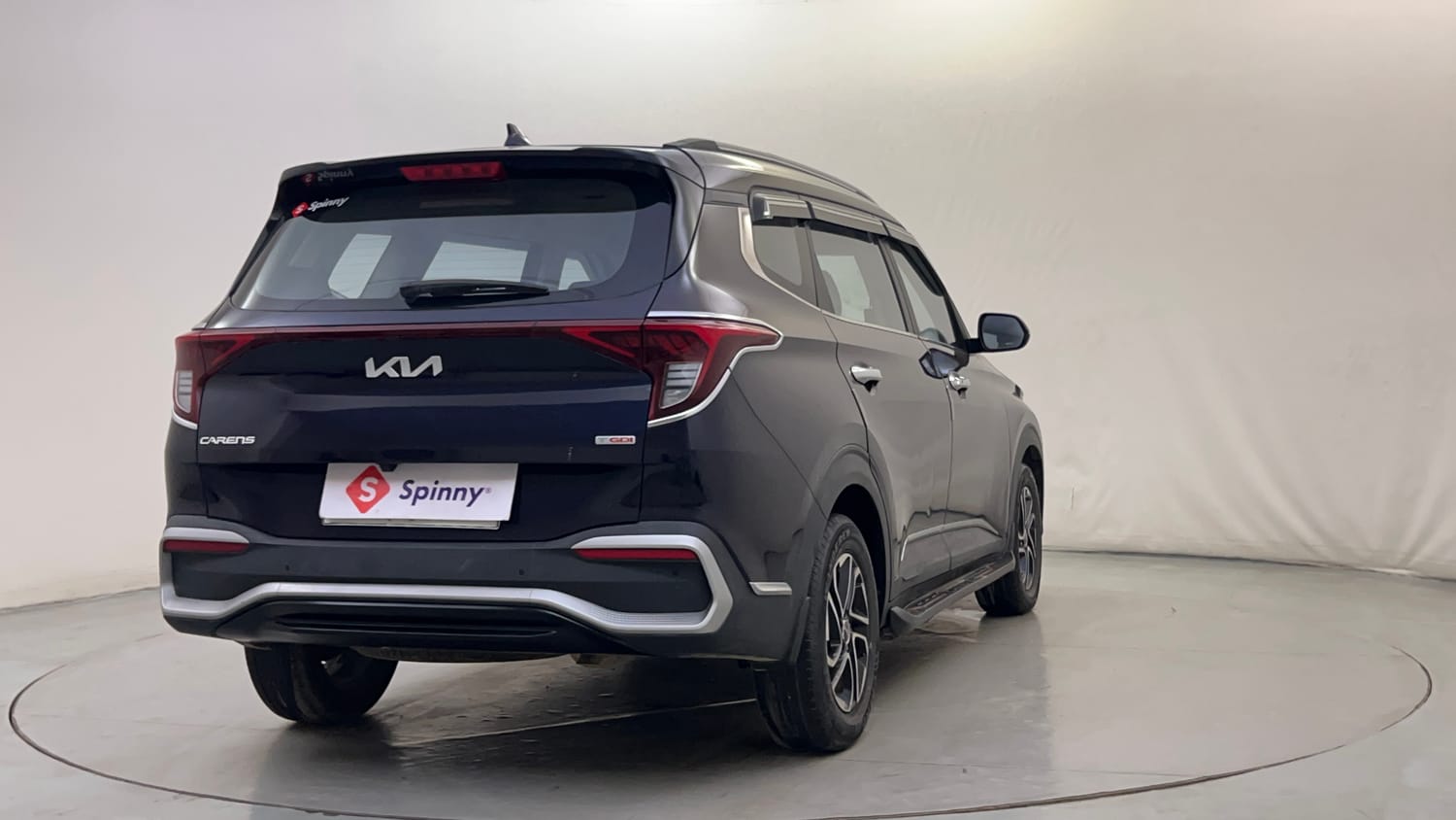 Used 2022 Kia Carens Prestige Plus 1.4 Petrol MT 7 STR Petrol Manual exterior RIGHT REAR CORNER VIEW