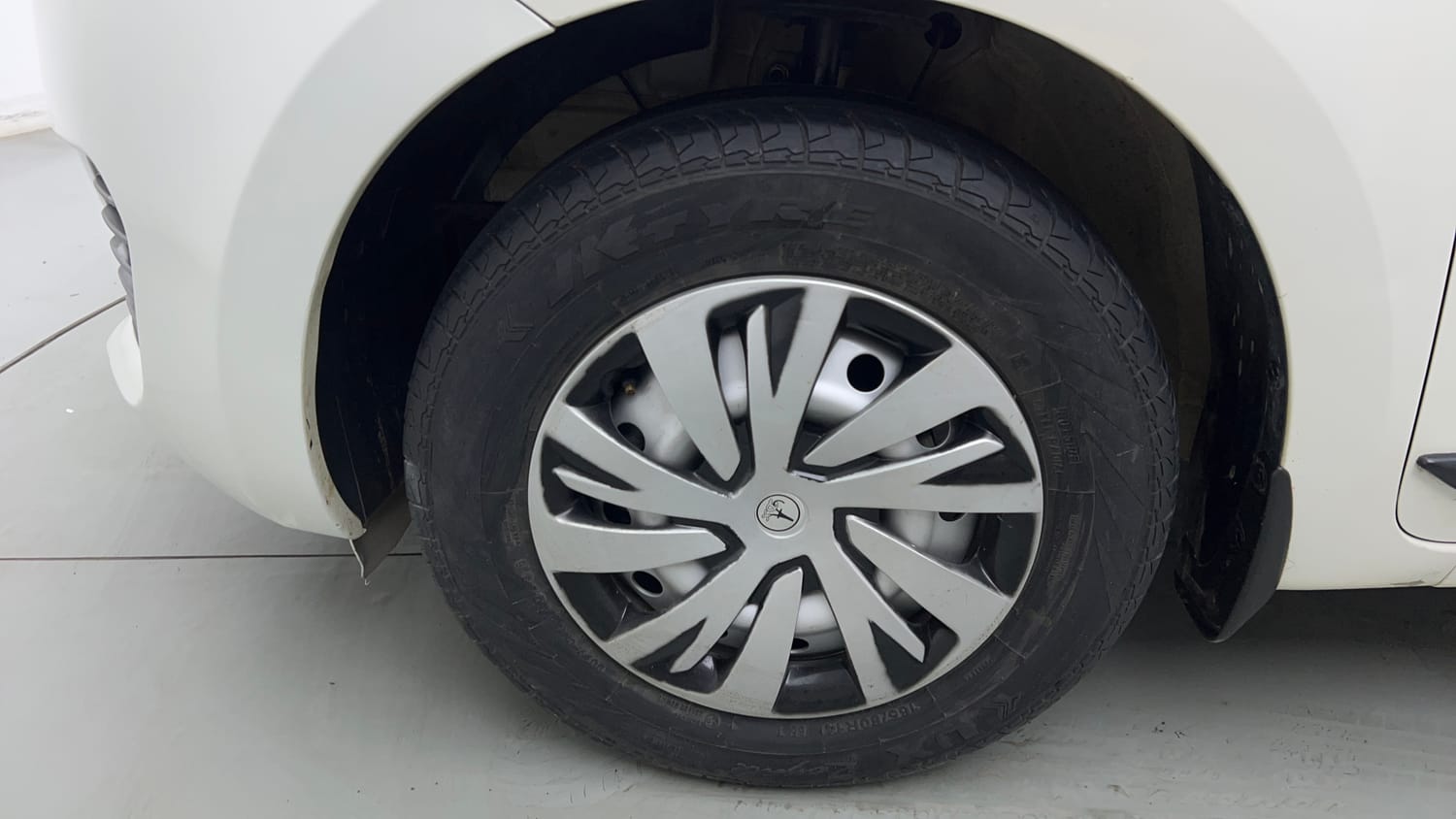 Used 2023 Maruti Suzuki Swift LXi Petrol Manual tyres LEFT FRONT TYRE RIM VIEW