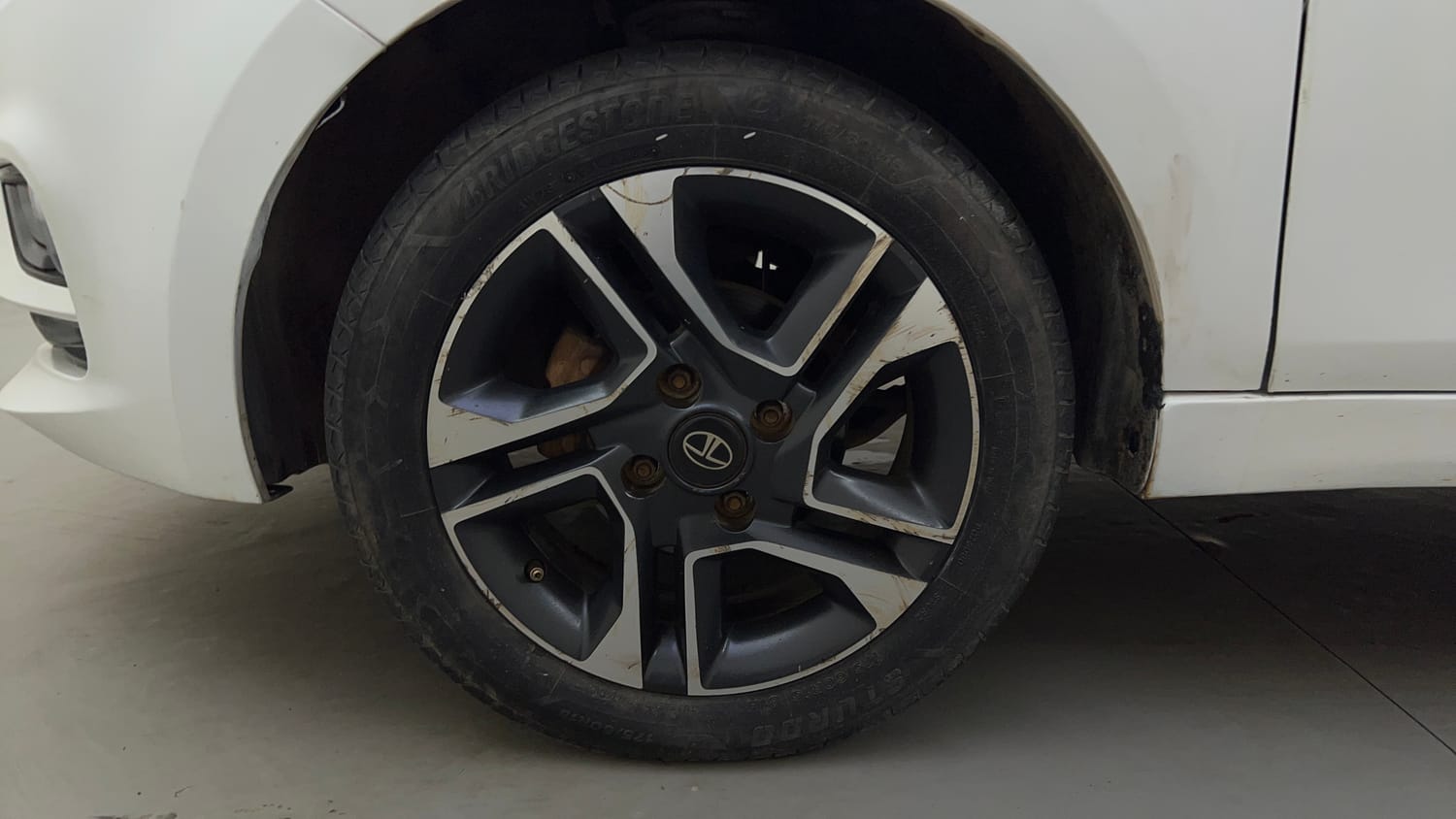 Used 2020 Tata Tiago XZA Plus Dual Tone Petrol Automatic tyres LEFT FRONT TYRE RIM VIEW