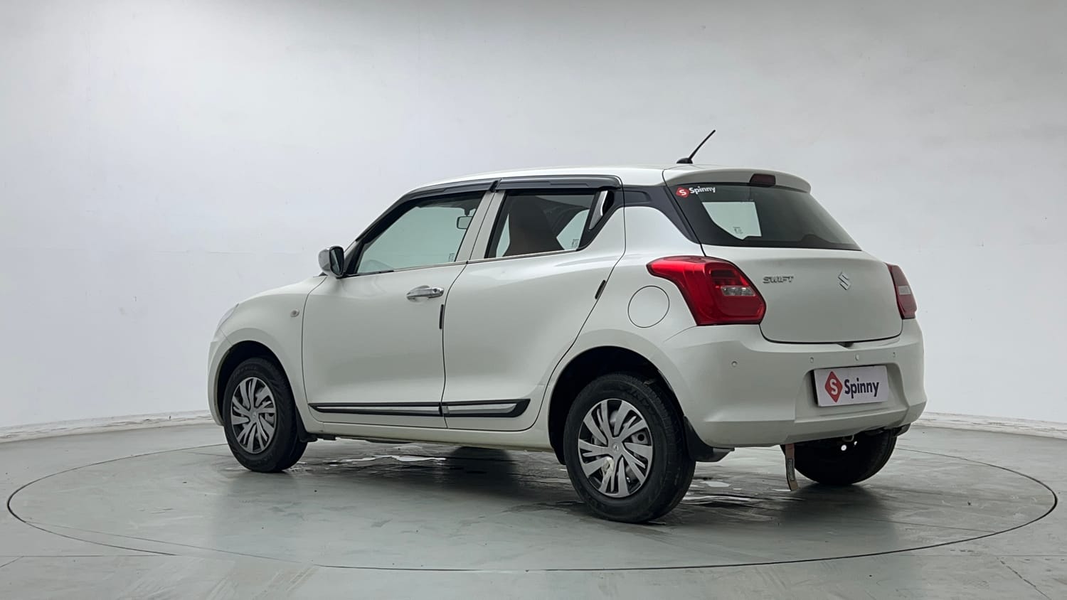 Used 2023 Maruti Suzuki Swift LXi Petrol Manual exterior LEFT REAR CORNER VIEW