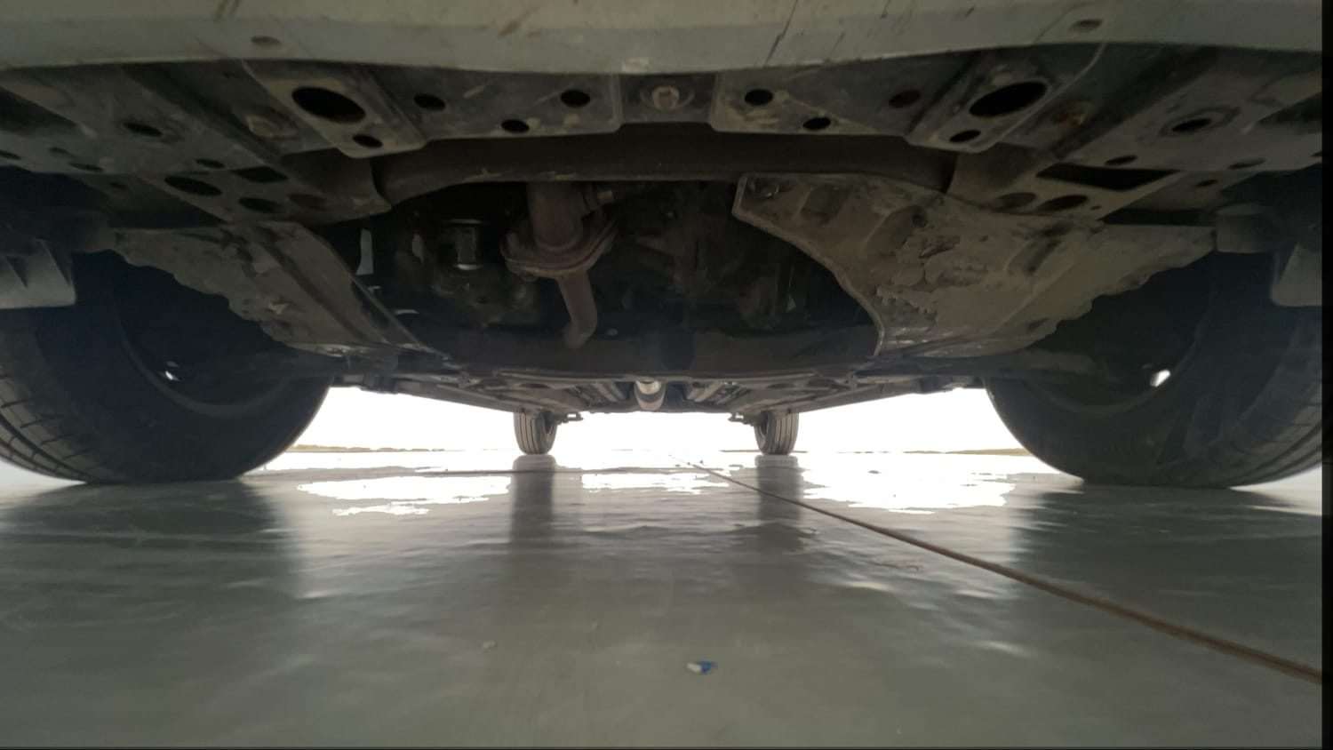 Used 2013 Maruti Suzuki Swift VXi Petrol Manual extra FRONT LEFT UNDERBODY VIEW
