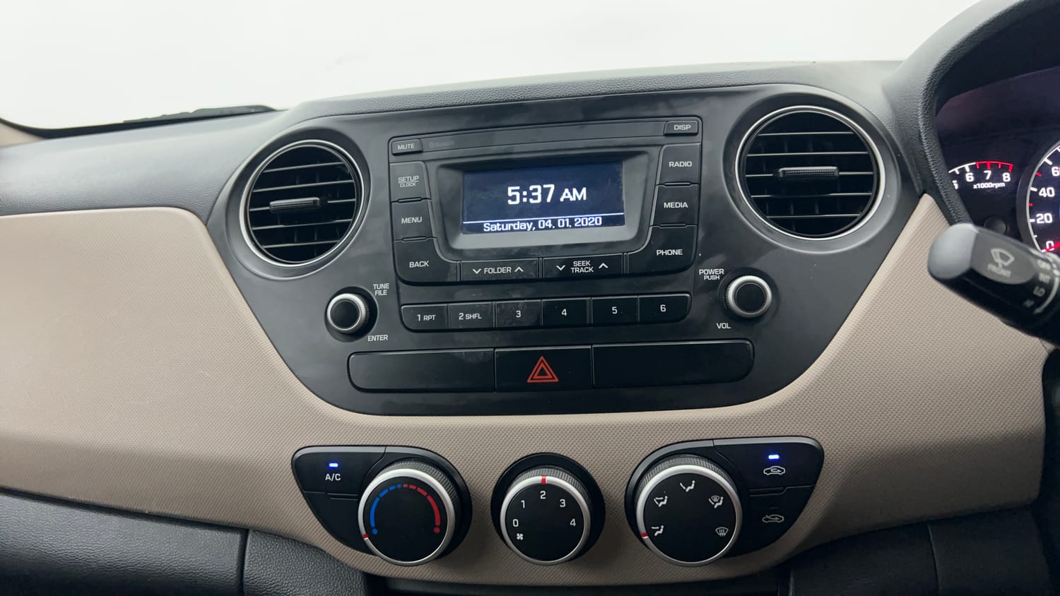 Used 2019 Hyundai Grand i10 Magna 1.2 Kappa VTVT Petrol Manual interior MUSIC SYSTEM & AC CONTROL VIEW