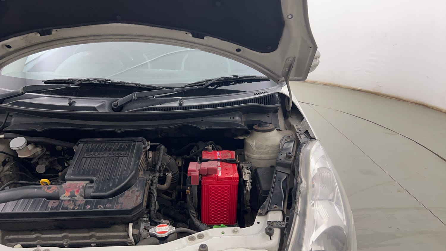Used 2013 Maruti Suzuki Swift VXi Petrol Manual engine ENGINE LEFT SIDE HINGE & APRON VIEW