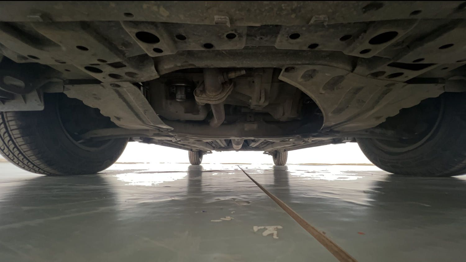 Used 2013 Maruti Suzuki Swift Dzire VXI Petrol Manual extra FRONT LEFT UNDERBODY VIEW