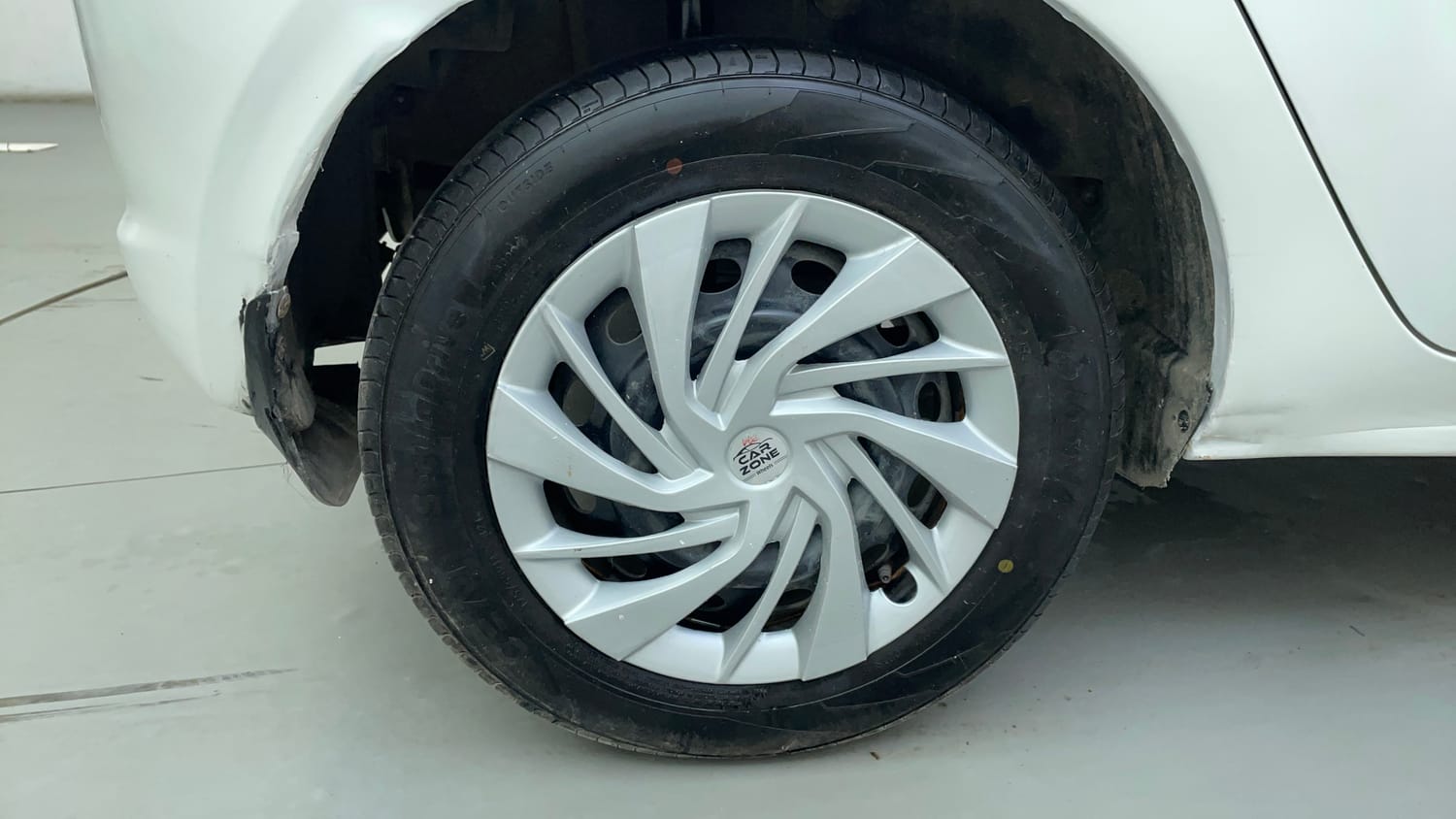 Used 2016 Tata Tiago Revotron XT Petrol Manual tyres RIGHT REAR TYRE RIM VIEW