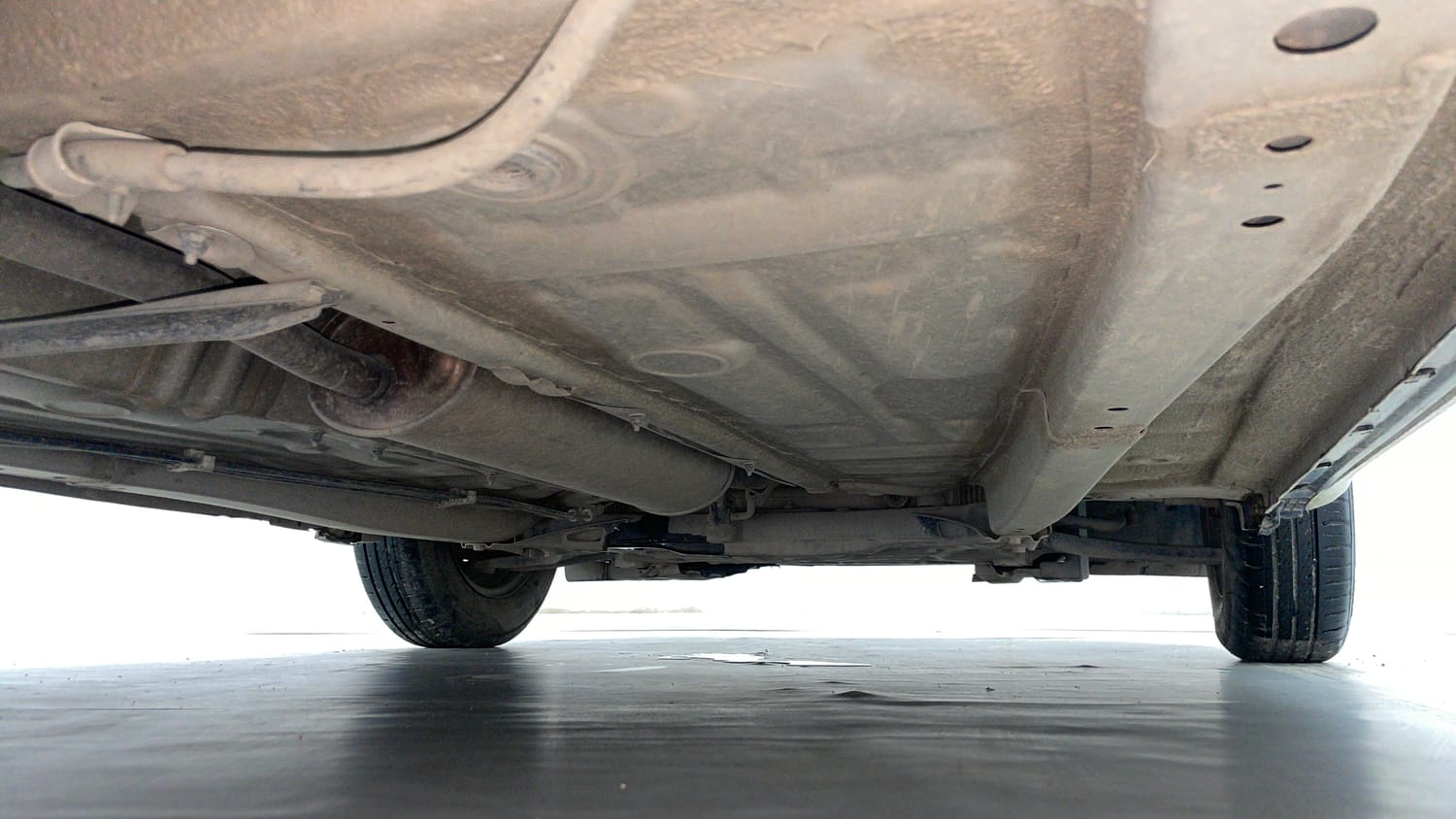 Used 2019 Maruti Suzuki Dzire VXi AMT Petrol Automatic extra REAR RIGHT UNDERBODY VIEW