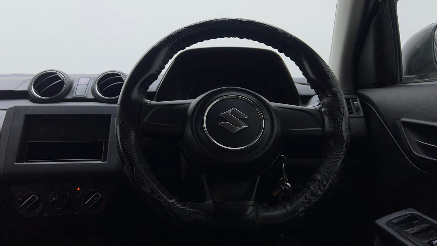 Used 2023 Maruti Suzuki Swift LXi Petrol Manual interior STEERING VIEW
