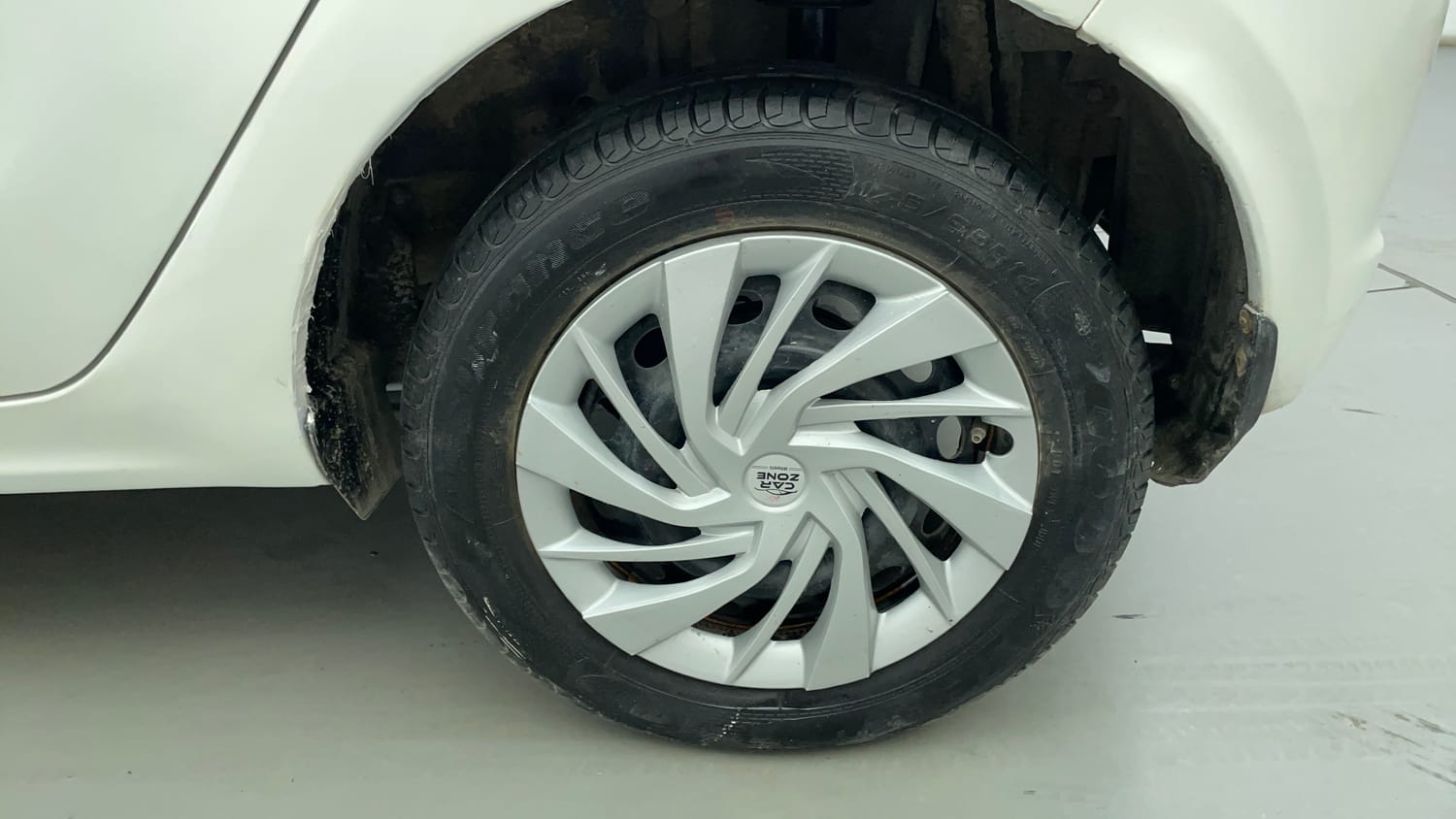 Used 2016 Tata Tiago Revotron XT Petrol Manual tyres LEFT REAR TYRE RIM VIEW