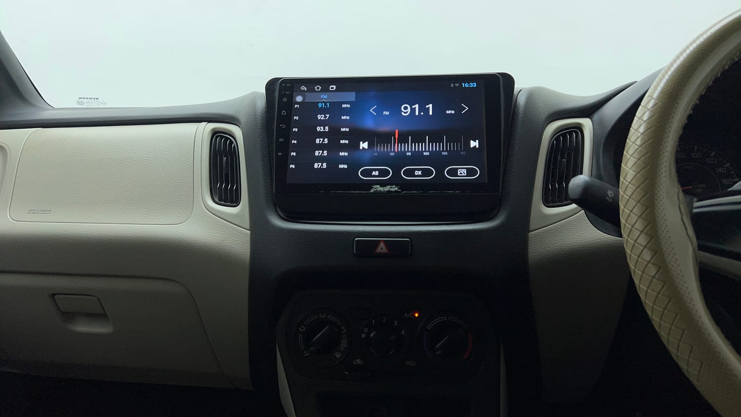 Used 2023 Maruti Suzuki Wagon R VXI 1.0 Petrol Manual top_features Integrated (in-dash) music system