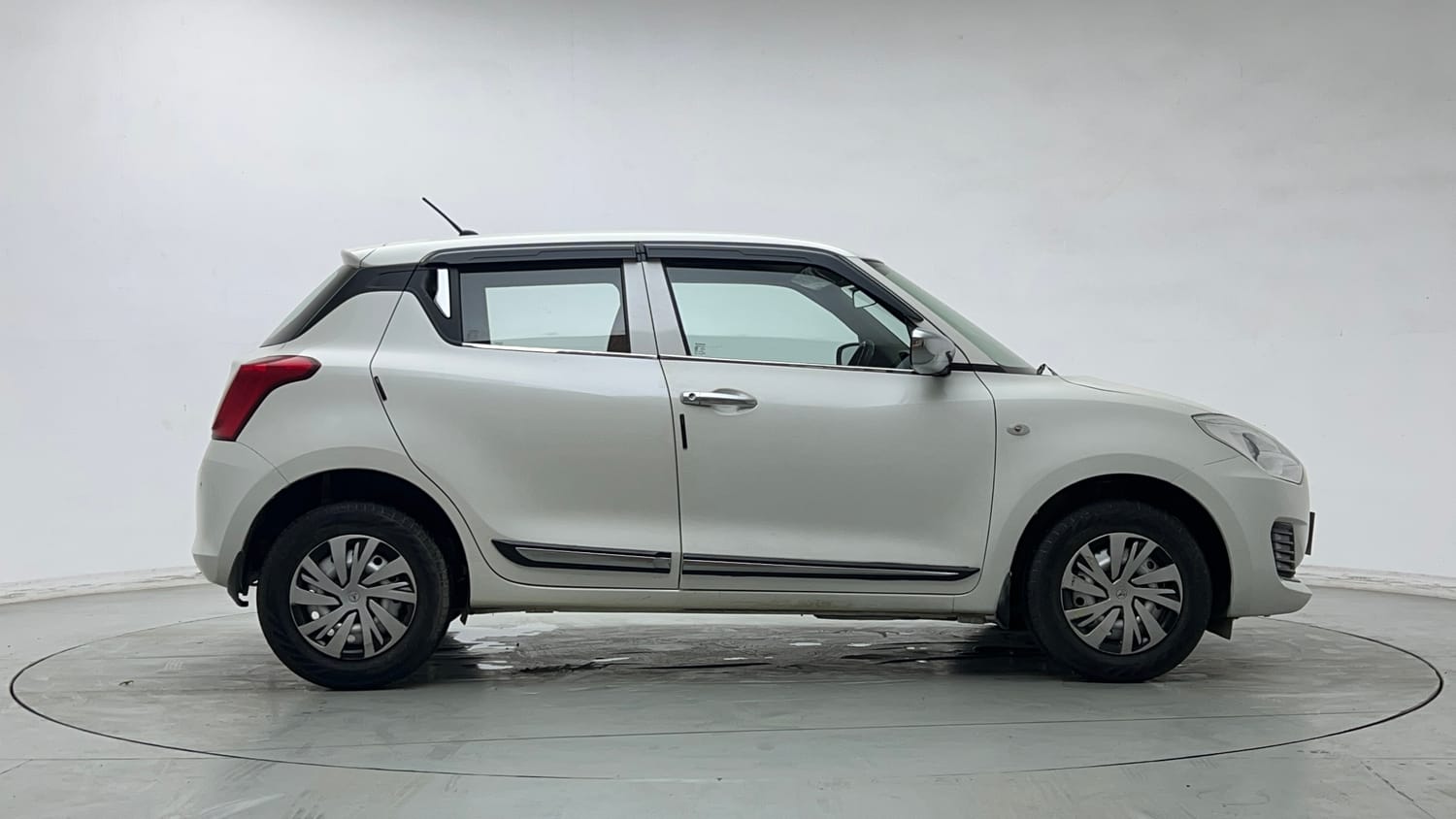 Used 2023 Maruti Suzuki Swift LXi Petrol Manual exterior RIGHT SIDE VIEW