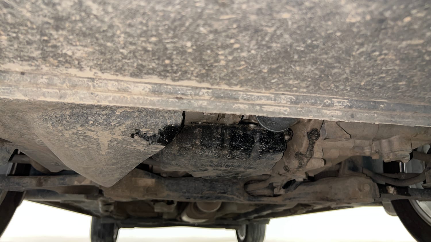 Used 2024 Skoda Slavia Ambition 1.0L TSI MT Petrol Manual extra FRONT LEFT UNDERBODY VIEW