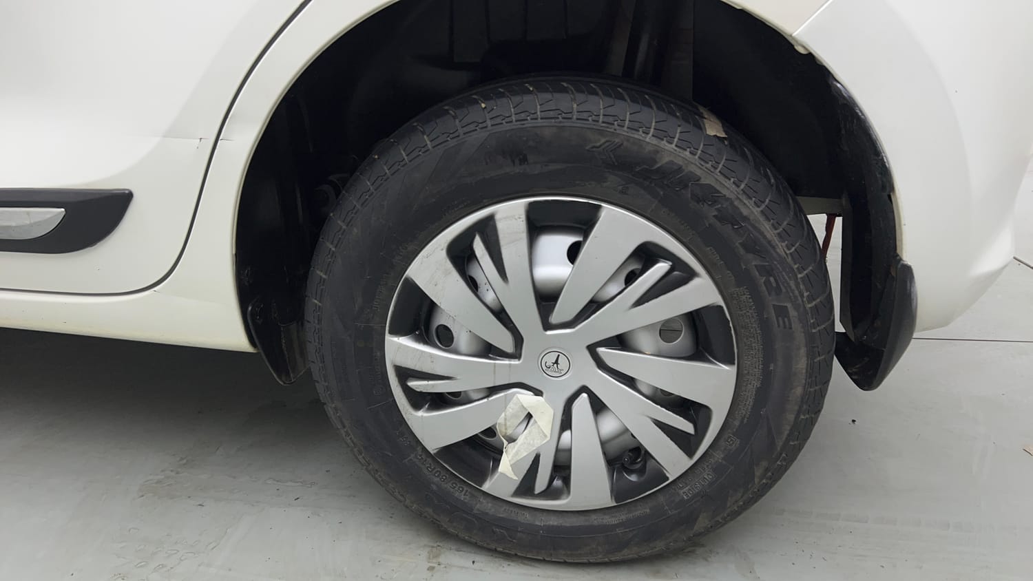 Used 2023 Maruti Suzuki Swift LXi Petrol Manual tyres LEFT REAR TYRE RIM VIEW