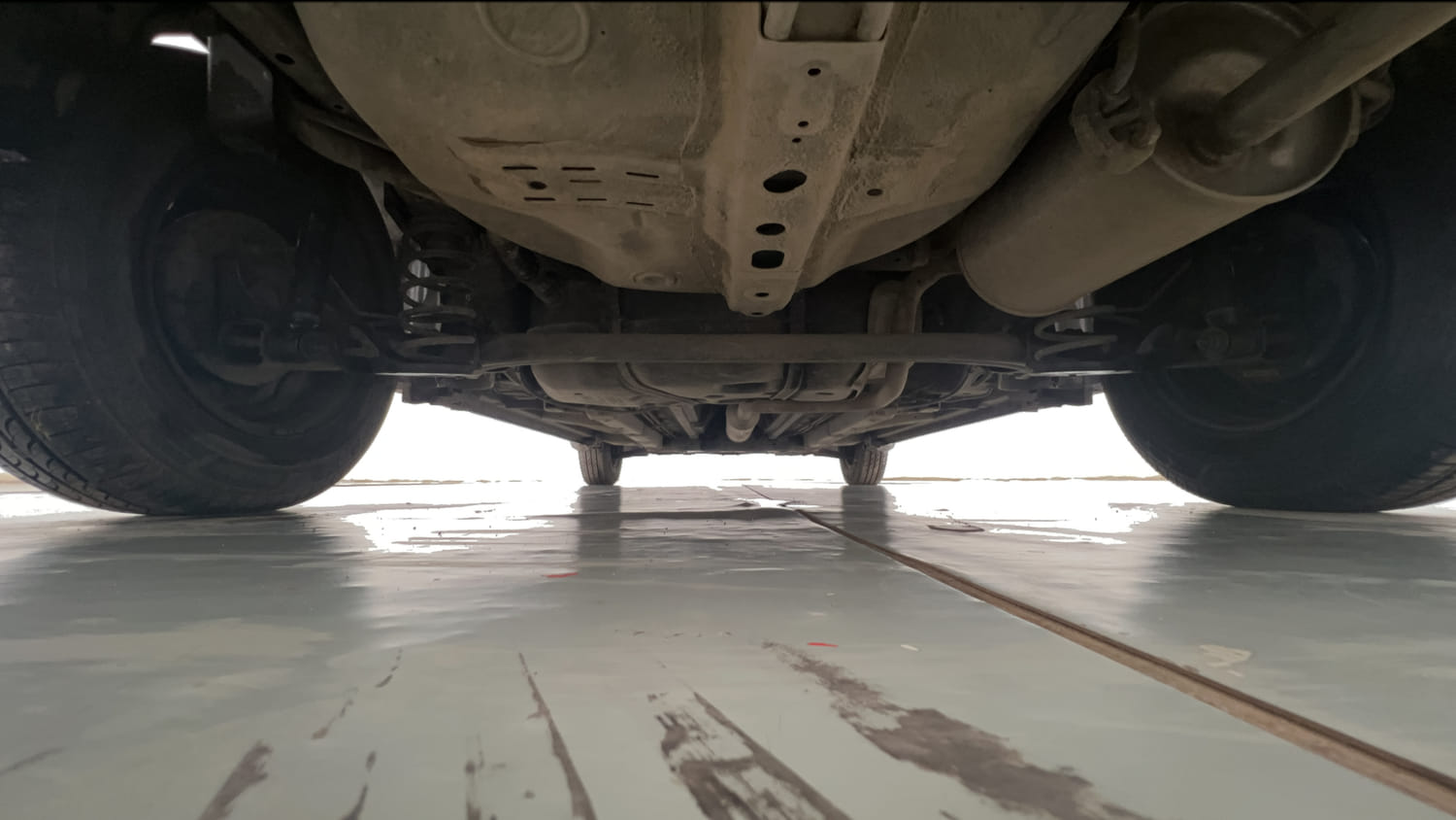 Used 2013 Maruti Suzuki Swift Dzire VXI Petrol Manual extra REAR UNDERBODY VIEW (TAKEN FROM REAR)