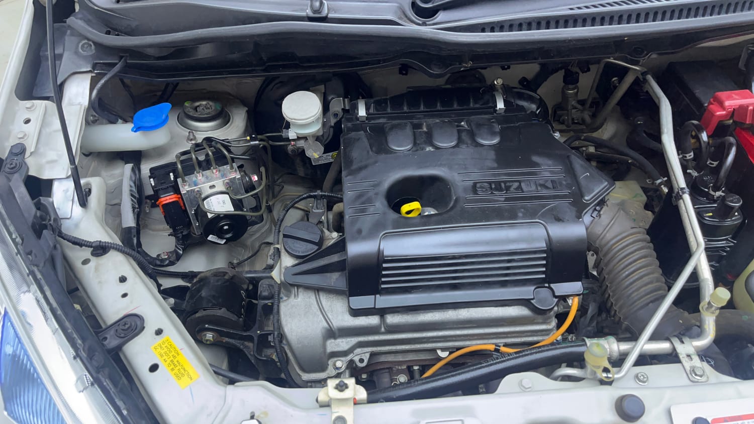 Used 2019 Maruti Suzuki Wagon R 1.0 VXI AMT (O) Petrol Automatic engine ENGINE RIGHT SIDE VIEW