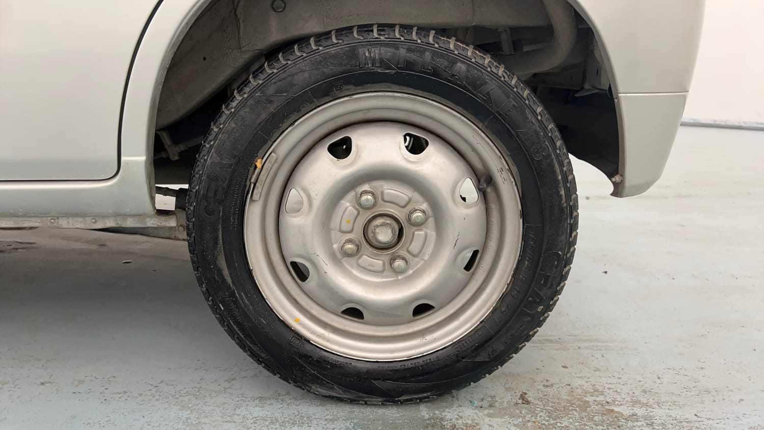 Used 2013 Maruti Suzuki Alto K10 LXi Petrol Manual tyres LEFT REAR TYRE RIM VIEW