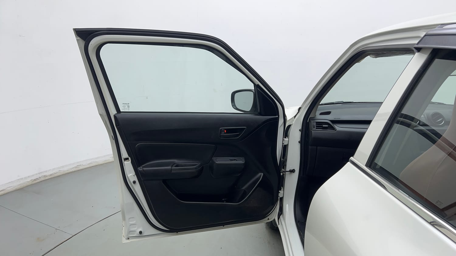 Used 2023 Maruti Suzuki Swift LXi Petrol Manual interior LEFT FRONT DOOR OPEN VIEW