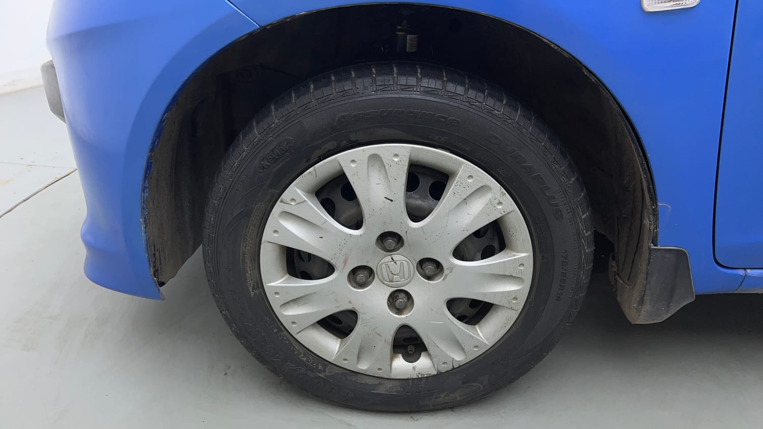 Used 2013 Honda Brio S MT Petrol Manual tyres LEFT FRONT TYRE RIM VIEW