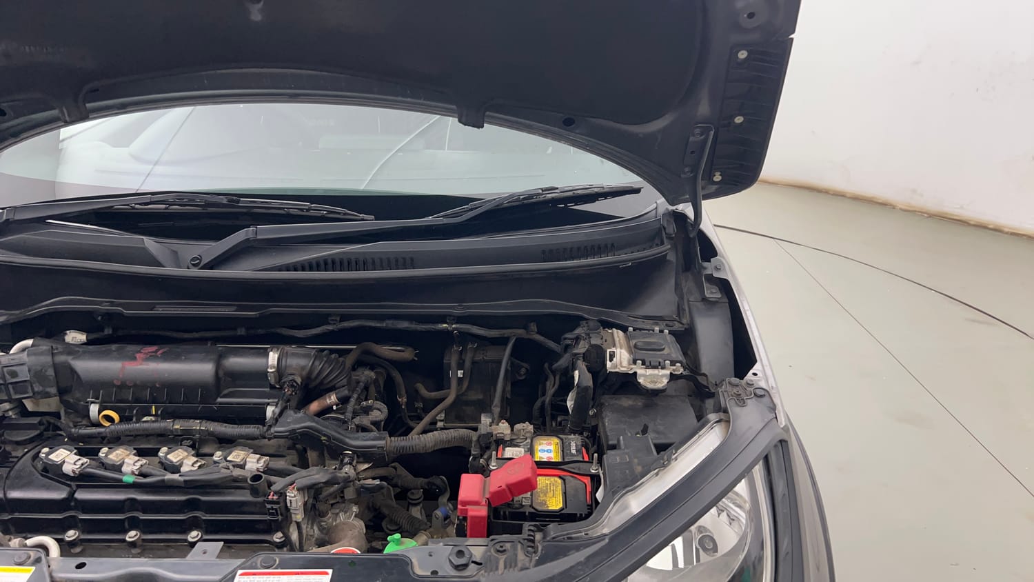 Used 2022 Maruti Suzuki Ignis Delta 1.2 MT Petrol Manual engine ENGINE LEFT SIDE HINGE & APRON VIEW