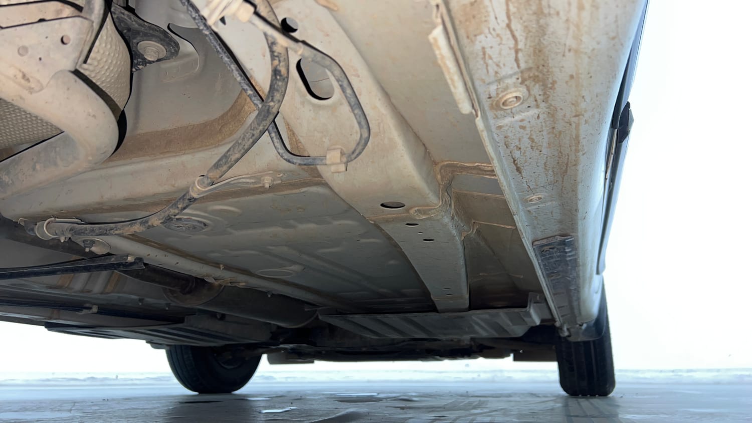 Used 2023 Maruti Suzuki Swift LXi Petrol Manual extra REAR RIGHT UNDERBODY VIEW