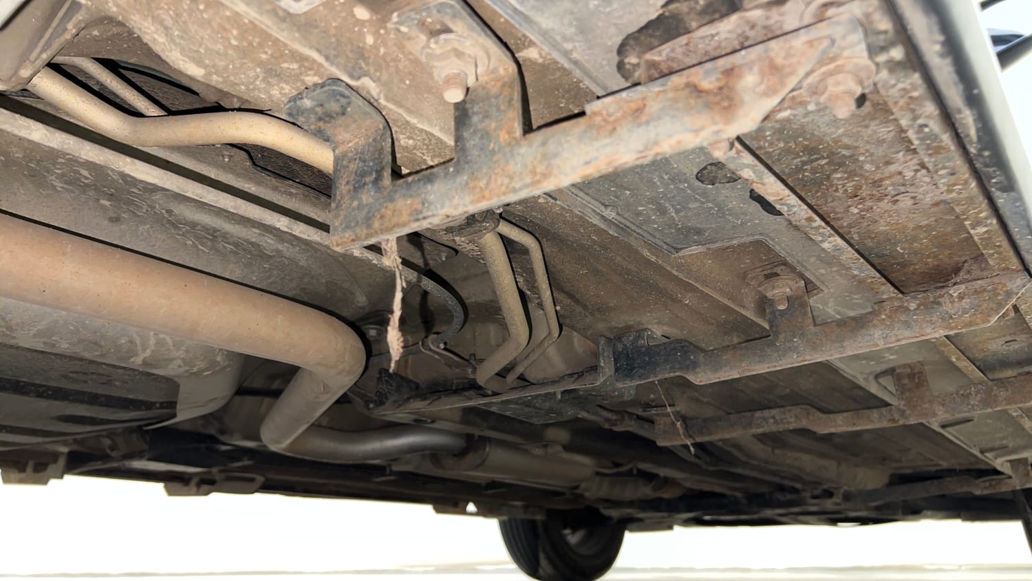Used 2022 Kia Carens Prestige Plus 1.4 Petrol MT 7 STR Petrol Manual extra REAR RIGHT UNDERBODY VIEW