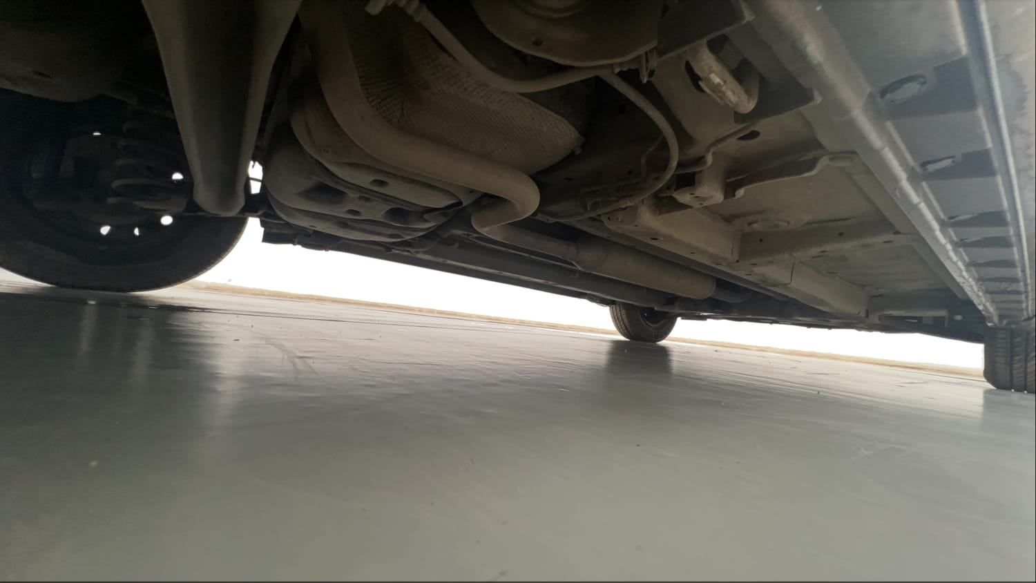 Used 2013 Maruti Suzuki Swift Dzire VXI Petrol Manual extra REAR RIGHT UNDERBODY VIEW