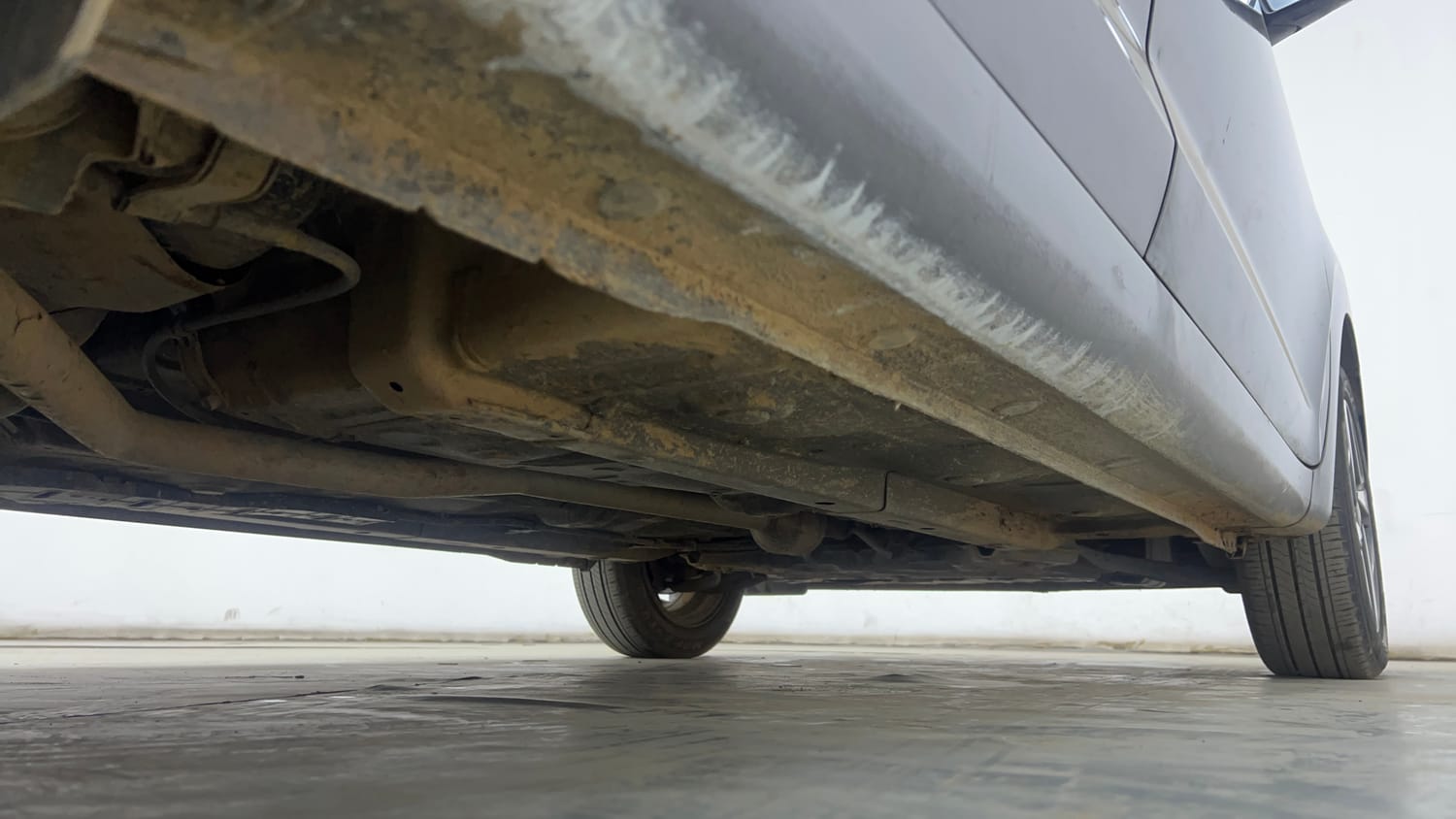 Used 2020 Hyundai Aura SX 1.2 (O) Petrol Petrol Manual extra REAR RIGHT UNDERBODY VIEW