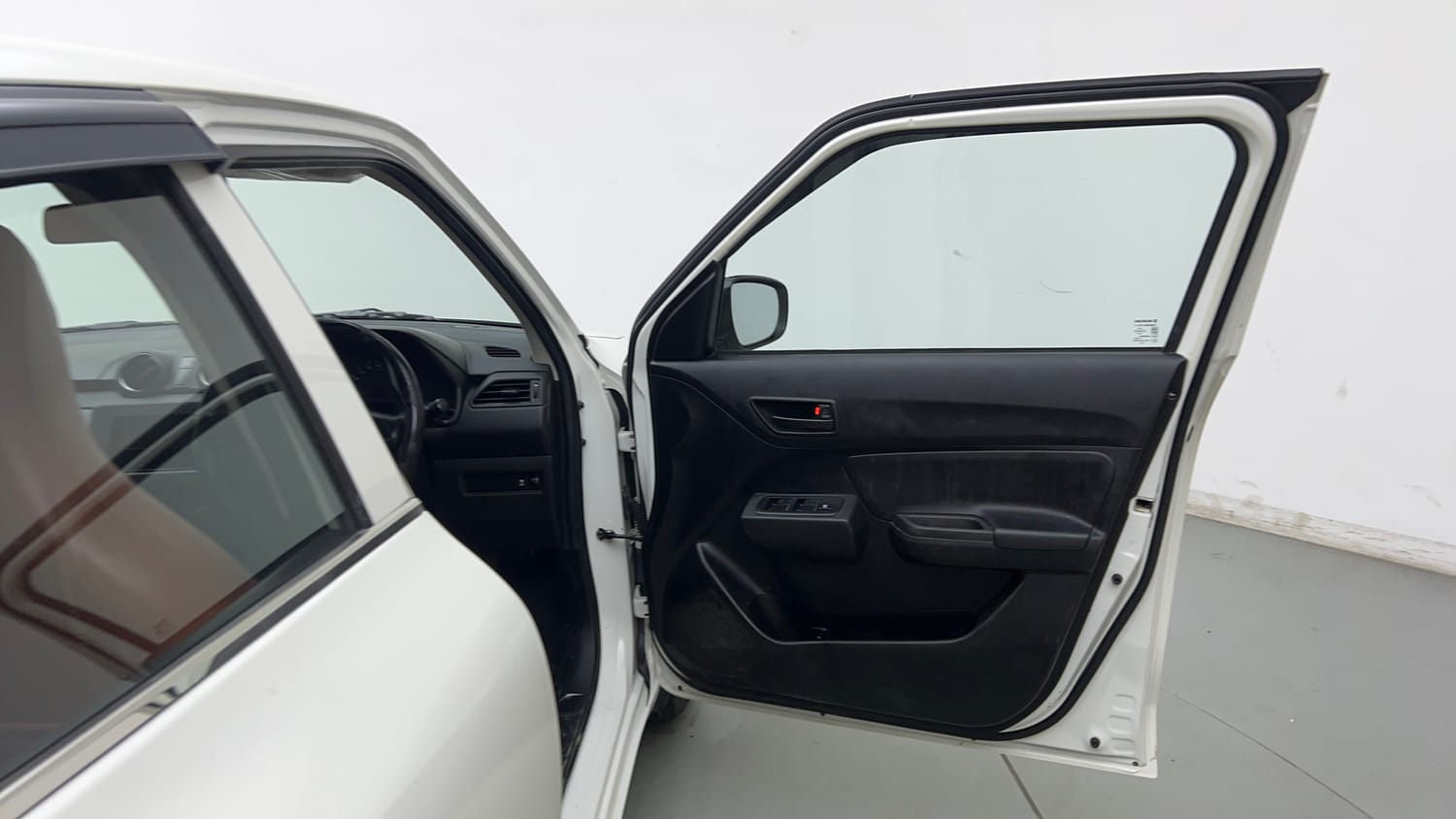 Used 2023 Maruti Suzuki Swift LXi Petrol Manual interior RIGHT FRONT DOOR OPEN VIEW