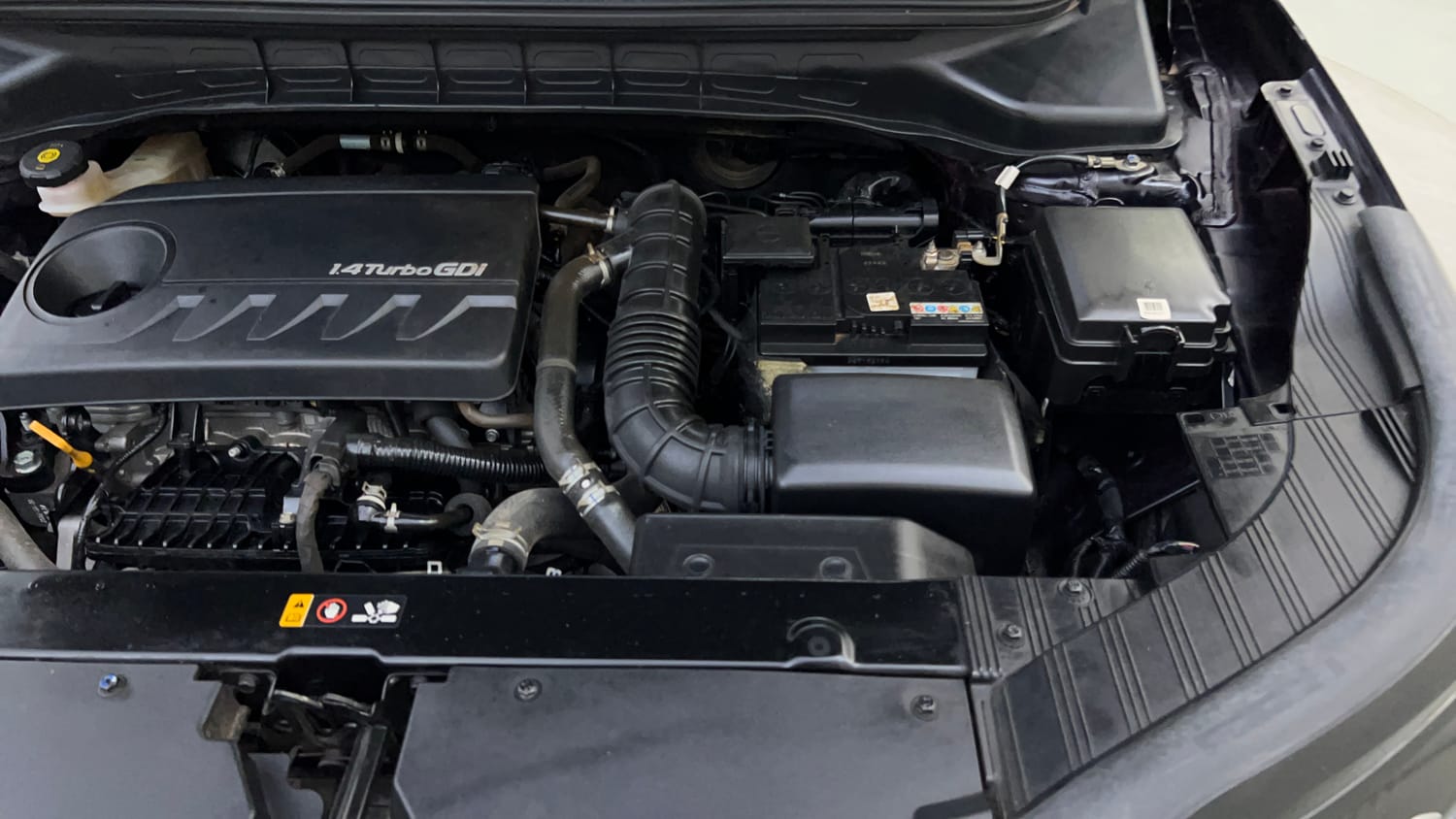 Used 2022 Kia Carens Prestige Plus 1.4 Petrol MT 7 STR Petrol Manual engine ENGINE LEFT SIDE VIEW