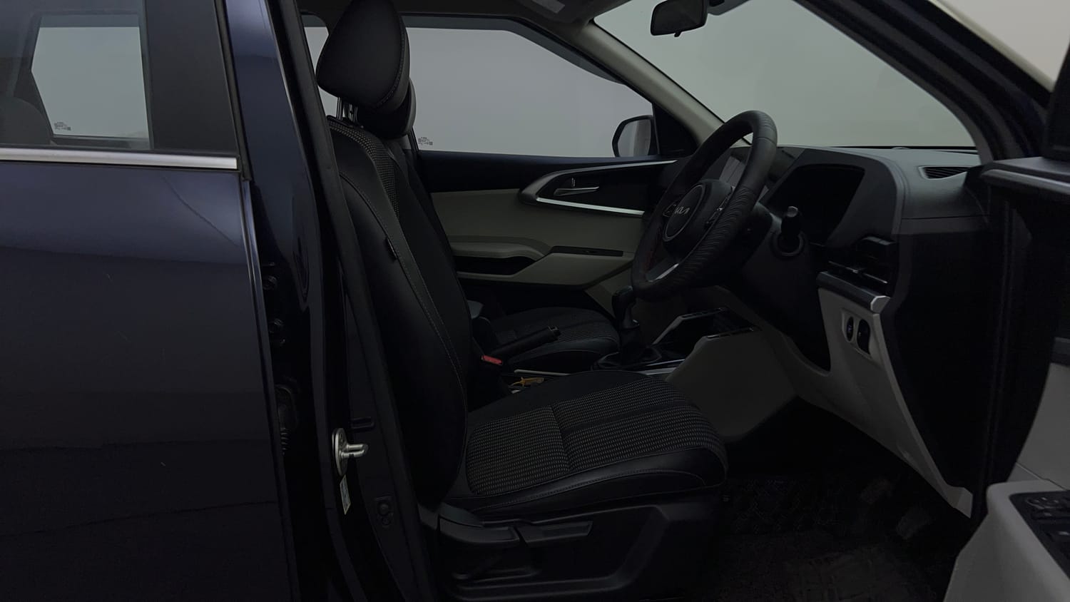 Used 2022 Kia Carens Prestige Plus 1.4 Petrol MT 7 STR Petrol Manual interior RIGHT SIDE FRONT DOOR CABIN VIEW