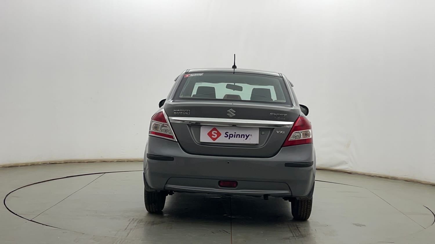 Used 2013 Maruti Suzuki Swift Dzire VXI Petrol Manual exterior BACK VIEW
