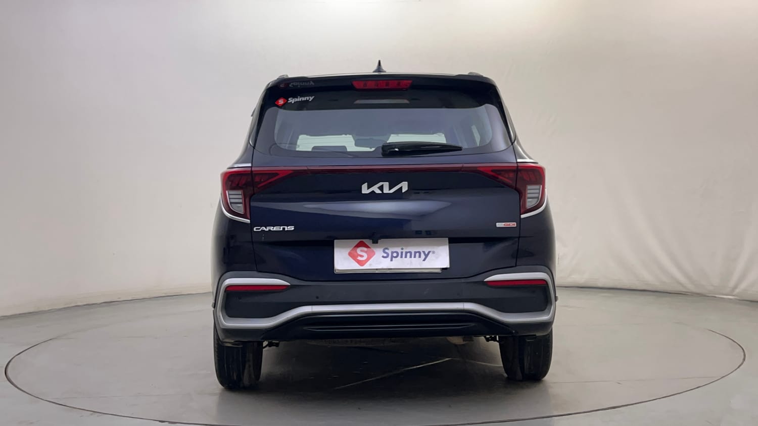Used 2022 Kia Carens Prestige Plus 1.4 Petrol MT 7 STR Petrol Manual exterior BACK VIEW