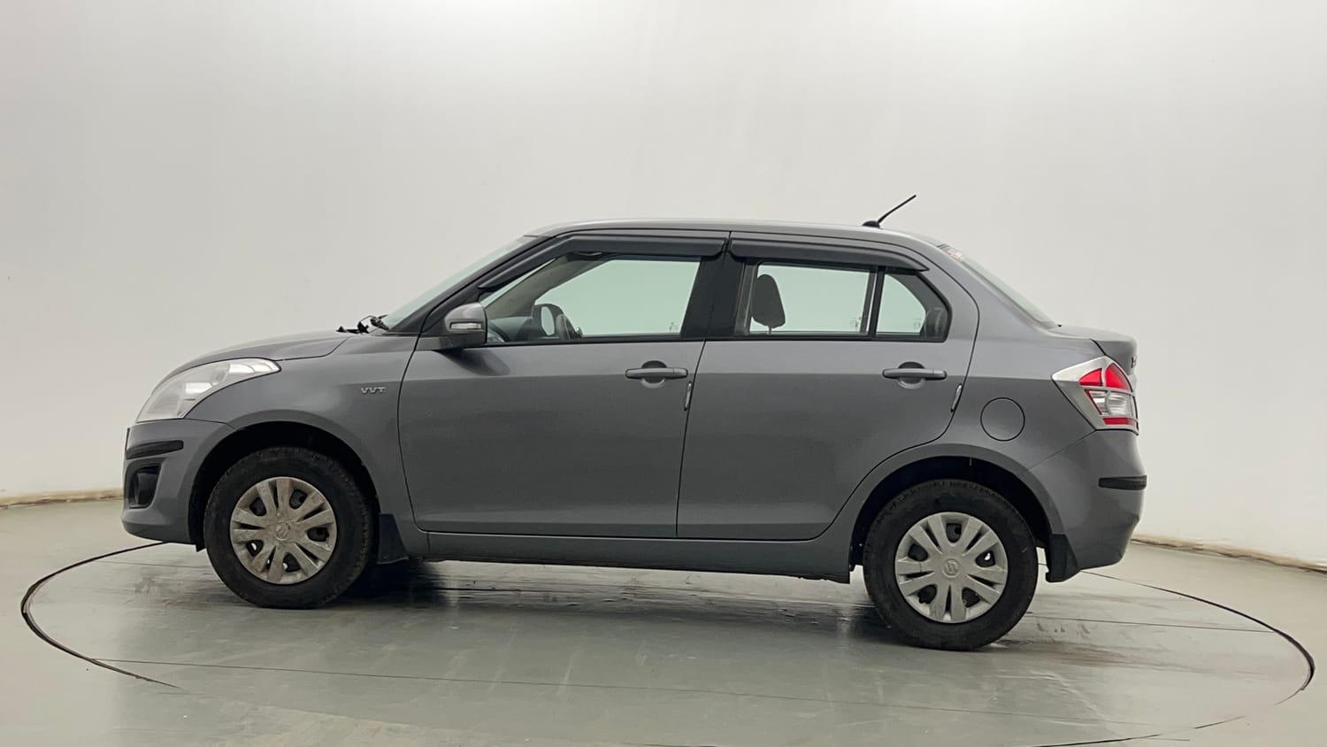 Used 2013 Maruti Suzuki Swift Dzire VXI Petrol Manual exterior LEFT SIDE VIEW