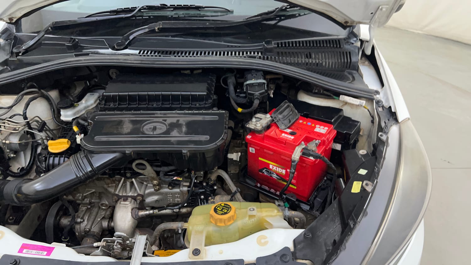 Used 2020 Tata Tiago XZA Plus Dual Tone Petrol Automatic engine ENGINE LEFT SIDE HINGE & APRON VIEW