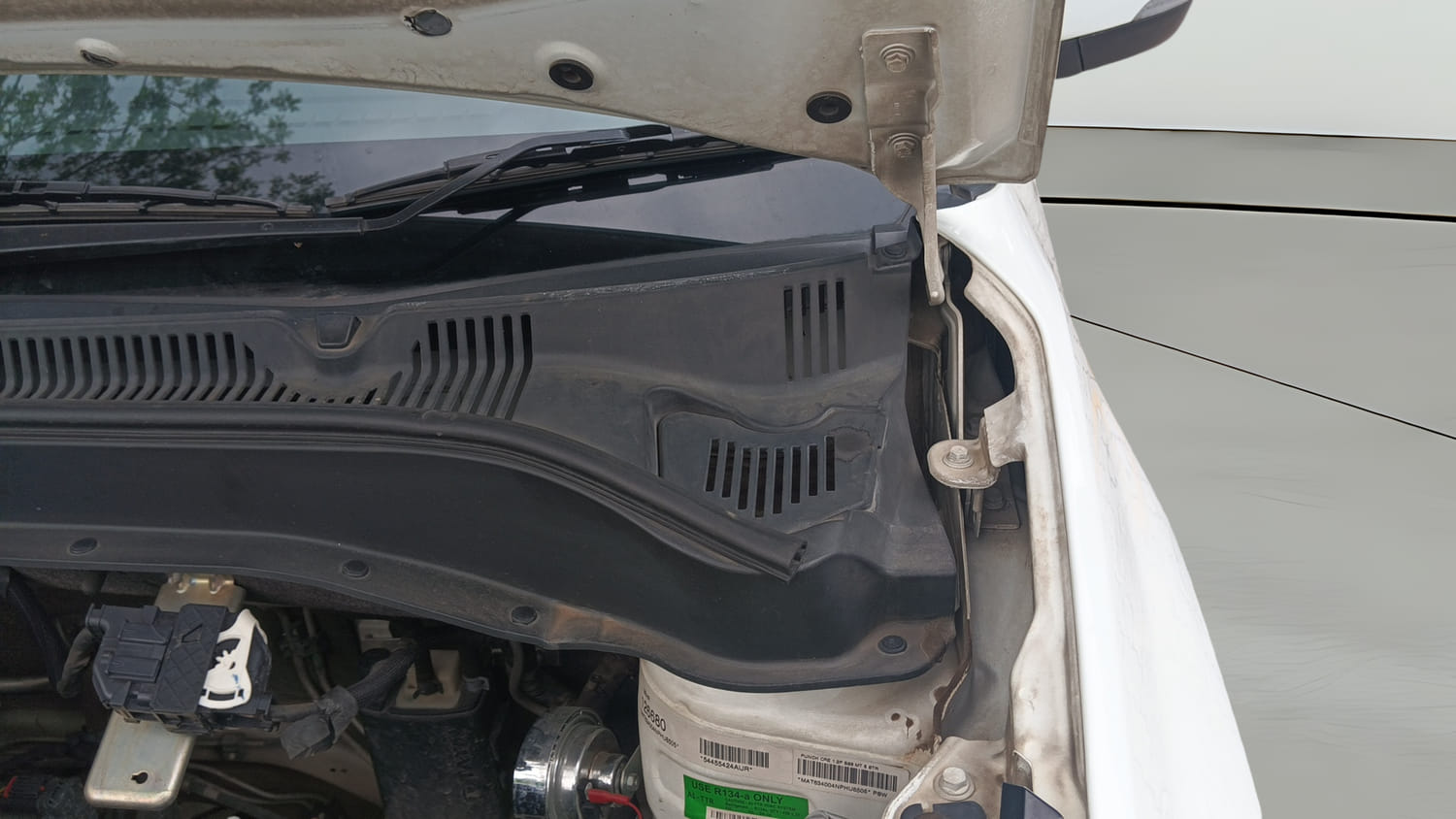 Used 2022 Tata Punch Creative MT Petrol Manual engine ENGINE LEFT SIDE HINGE & APRON VIEW