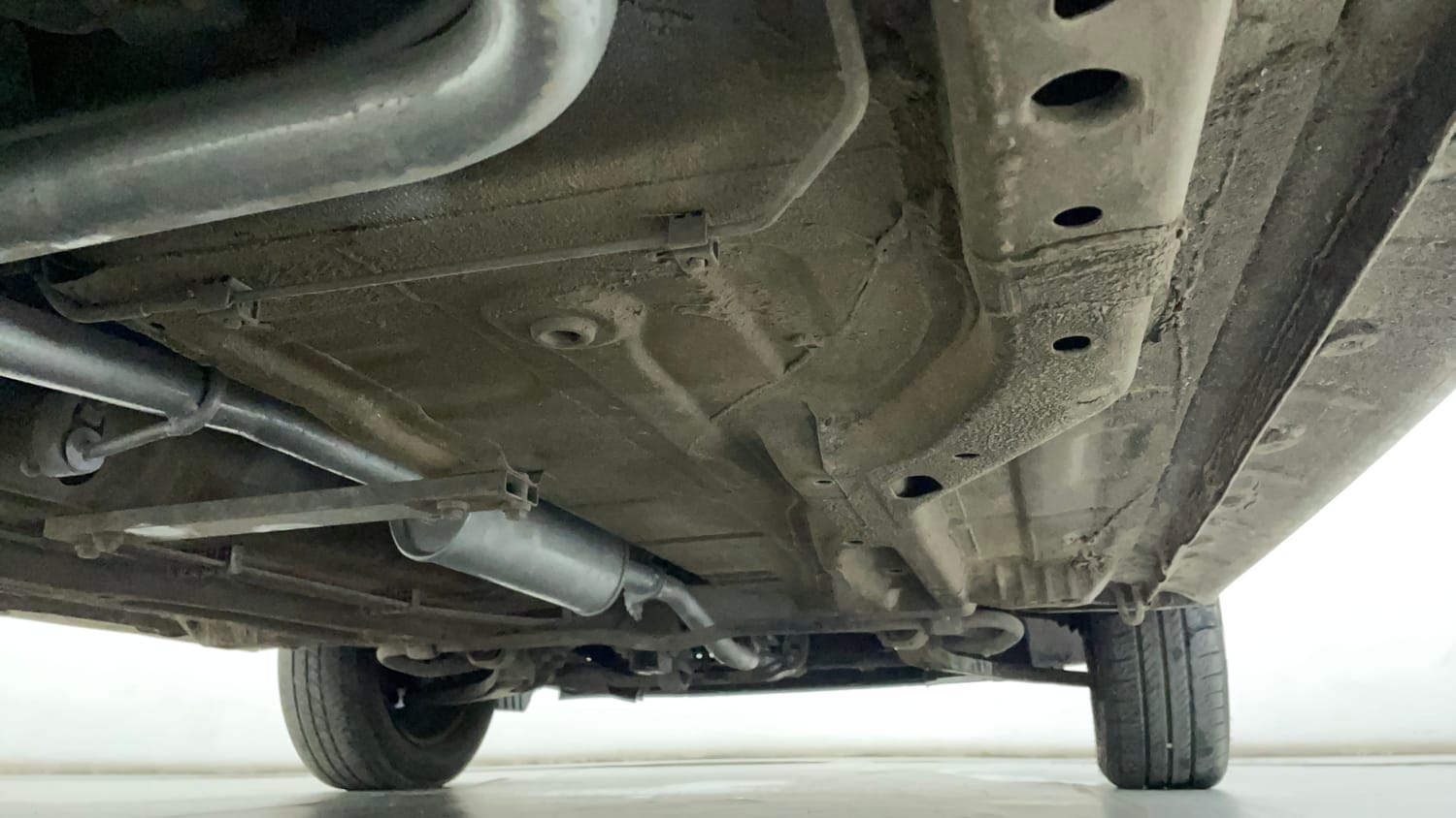 Used 2016 Tata Tiago Revotron XT Petrol Manual extra REAR RIGHT UNDERBODY VIEW