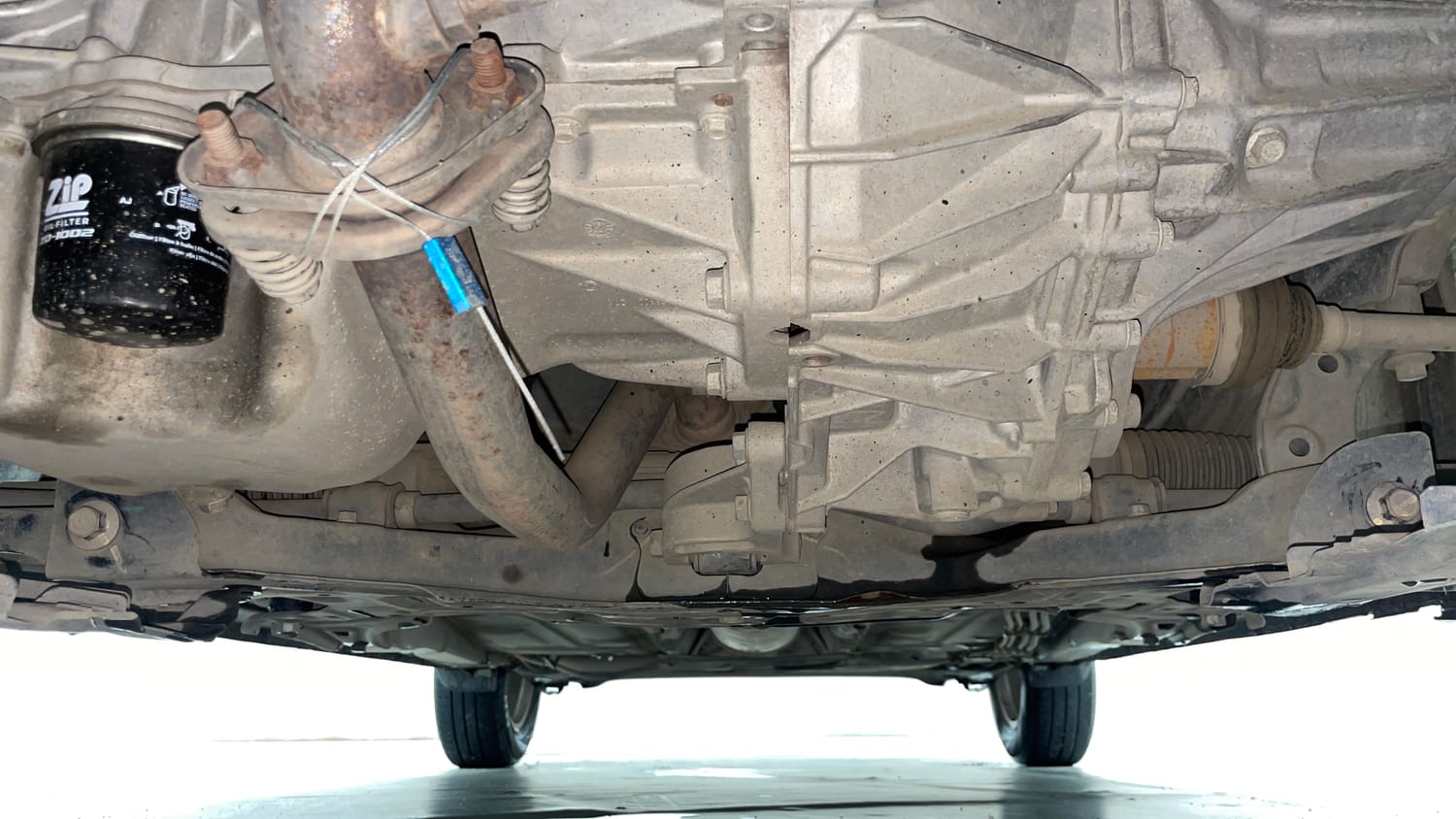 Used 2019 Maruti Suzuki Dzire ZXi AMT Petrol Automatic extra FRONT LEFT UNDERBODY VIEW