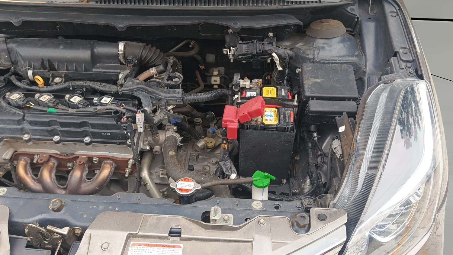 Used 2021 Maruti Suzuki Baleno Delta Petrol Manual engine ENGINE LEFT SIDE VIEW