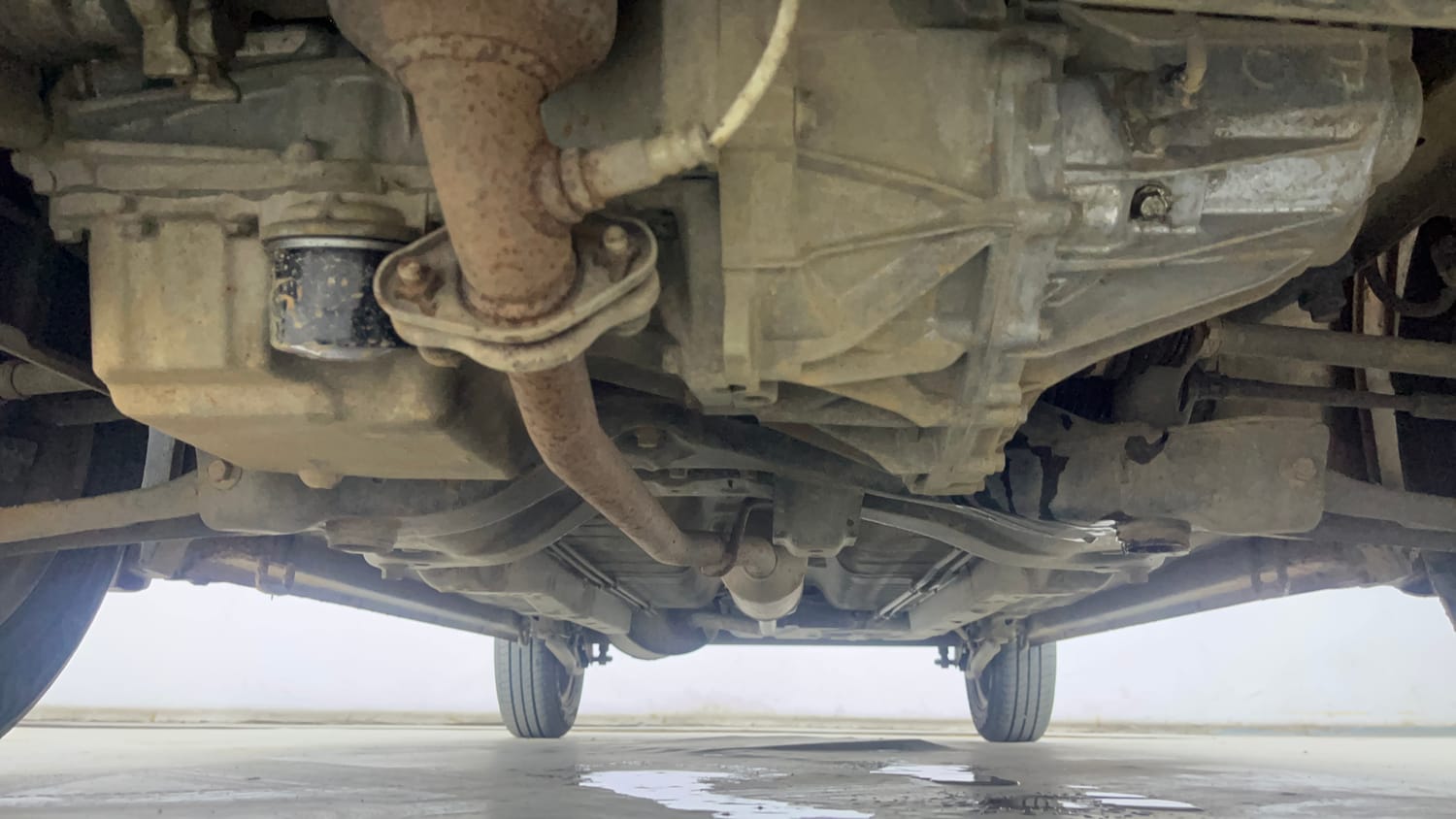 Used 2019 Maruti Suzuki Wagon R 1.0 VXI AMT (O) Petrol Automatic extra FRONT LEFT UNDERBODY VIEW