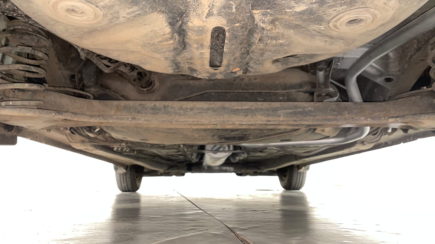 Used 2018 Maruti Suzuki Dzire VXi AMT Petrol Automatic extra REAR UNDERBODY VIEW (TAKEN FROM REAR)