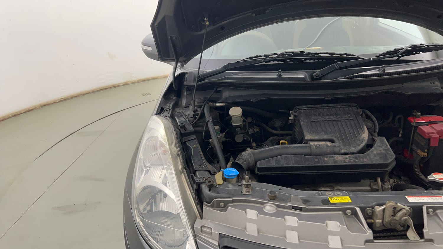 Used 2013 Maruti Suzuki Swift Dzire VXI Petrol Manual engine ENGINE RIGHT SIDE HINGE & APRON VIEW