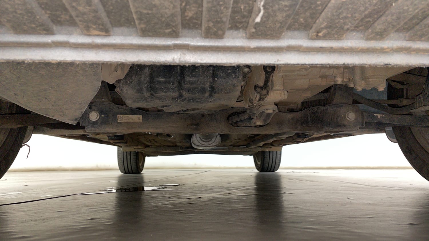 Used 2023 Volkswagen Virtus Highline 1.0 TSI MT Petrol Manual extra FRONT LEFT UNDERBODY VIEW