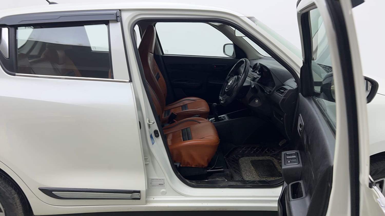 Used 2023 Maruti Suzuki Swift LXi Petrol Manual interior RIGHT SIDE FRONT DOOR CABIN VIEW