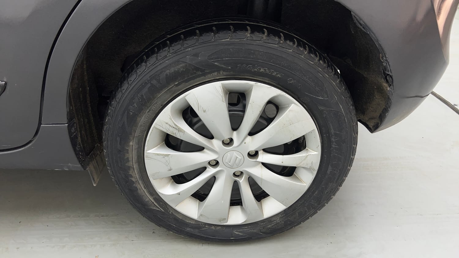 Used 2017 Maruti Suzuki Baleno Delta 1.2 Petrol Manual tyres LEFT REAR TYRE RIM VIEW